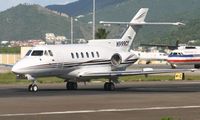 N999CY @ TNCM - Back tracking runway 28 for take off