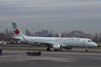 C-FFYM @ KLGA - ERJ 190-100 IGW - by Mark Pasqualino