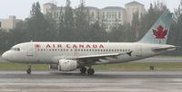 C-GBIA @ TJSJ - Air Canada Taxing to the active runway for take off on a wet day