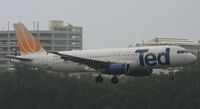 N407UA @ TJSJ - Ted A320-232 landing at tjsj on a very wet day