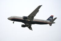 N107US @ KORD - USAirways Airbus A320-214, AWE1996	 arriving from KPHL on 27L. - by Mark Kalfas