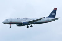 N653AW @ DFW - US Airways landing at DFW - by Zane Adams