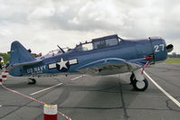 G-BRVG @ EGSX - North American SNJ-7C Texan at North Weald Airfield, UK in 1990. - by Malcolm Clarke