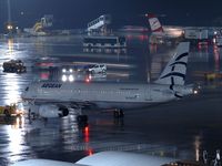 SX-DVS @ VIE - New route from ATH to VIE operated by Aegean; first flight was on the 10th of December - by P. Radosta - www.austrianwings.info