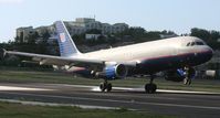 N409UA @ TNCM - United airlines landing at tncm