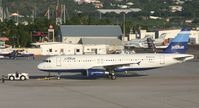 N517JB @ TNCM - Jet blue N517JB being push back from the gates - by Daniel Jef