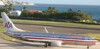 N904AN @ TNCM - American airlines taxing to a for take off
