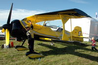 SE-XZA @ ENRY - Jacob Holländer fills up the oil of his Pitts 12S Python in preparation for his display at Rygge air force base, Norway.