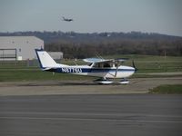 N8776U @ KLUK - Two Cessna products in one! Citation X N49FW on approach in the background - by Kevin Kuhn