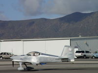 N434DR @ CCB - On the runway, tail wheel still up - by Helicopterfriend