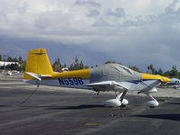 N559B @ CCB - Parked, tied down and covered in transient parking - by Helicopterfriend