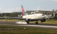 N306DQ @ TNCM - Delta airlines landing at tncm
