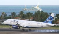 N563JB @ TNCM - Jet blue landing at tncm