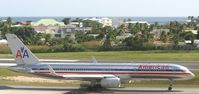 N676AN @ TNCM - American airlines taxing to A