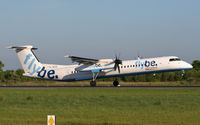 G-JECG @ EGCC - Touching down on Runway 05R. - by MikeP