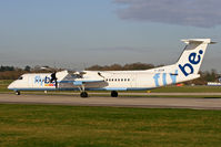 G-JECM @ EGCC - Rolling down Runway 24L. - by MikeP