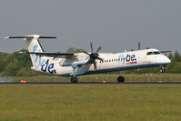 G-JECW @ EGCC - Setting down on Runway 05R. - by MikeP
