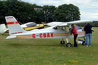 G-CBAX @ EGBP - Tecnam P.92-EM Echo [PFA 318-13698] Kemble~G 09/07/2004. Seen at the PFA Fly in 2004 Kemble UK. The pilot is having a tinker with the engine. - by Ray Barber
