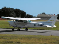 G-BJWI @ EGHH - Taken from the Flying Club - by planemad