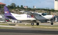 N975FE @ TNCM - Fedex caravan departing St Maarten