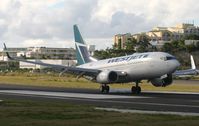 C-FKWS @ TNCM - Canjet landing at TNCM - by SHEEP GANG