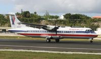 N420AT @ TNCM - American eagle ATR72 landing at TNCM in from San Juan
