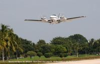 N699PS @ 07FA - Take off at Ocean Reef - by J.G. Handelman