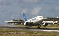 C-GSAT @ TNCM - Air transat A310 touching down on runway 10 at TNCM - by Daniel Jef