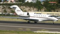 N908QS @ TNCM - N908QS departing on on runway 10 - by SHEEP GANG