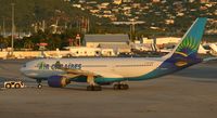 F-OFDF @ TNCM - Air caraibes A330-200 being push back by ground crew from the gate - by SHEEP GANG