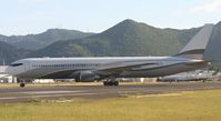 P4-MES @ TNCM - P4-MES Exiting the runway on C for parking on the ramp
