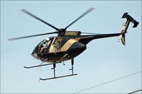 N888SD - N888SD working over powerlines - by jlboone