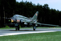 8309 @ KLINISKA - This Su-22 is preparing for take off on the Kliniska highway. This picture shows how narrow the highway strip actually is. The wings are over the verge! - by Joop de Groot