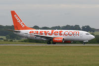 G-EZJU @ EGGW - About to backtrack for a full-length 26 departure. - by MikeP