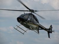 N407PS @ KLUK - Big Bell coming in! - by Kevin Kuhn