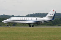 TC-IST @ EGGW - Touching down on Runway 26. - by MikeP