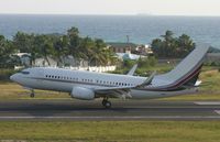 N129QS @ TNCM - N129QS landing at TNCM runway 10
