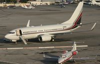 N129QS @ TNCM - N129QS at the gates debarking the passengers
