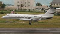 N410UJ @ TNCM - N410UJ Landing at TNCM ST MAARTEN - by Daniel Jef
