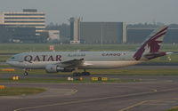 A7-AFB @ EHAM - Heading for a late afternoon departure. - by MikeP