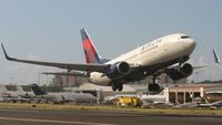 N305DQ @ TNCM - TAke off for the Delta N305DQ