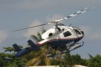 N904AF @ TNCM - N904AF landing at the helipad - by SHEEP GANG