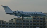 N905LP @ TNCM - N905LP just over Maho beach for landing on runway 10 - by SHEEP GANG