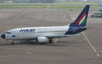HA-LOL @ EHAM - Heading to the Runway after pushback. - by MikeP