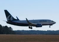N337AT @ SHV - About to touch down on runway 23 at the Shreveport Regional airport. This was a charter from Atlanta for the Independence Bowl with the Georgia Bulldogs beating  Texas A & M. - by paulp