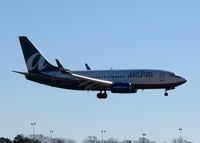 N337AT @ SHV - About to touch down on runway 23 at the Shreveport Regional airport. This was a charter from Atlanta for the Independence Bowl with the Georgia Bulldogs beating Texas A & M. - by paulp