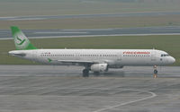 TC-FBG @ EBBR - Heading to 07R for departure in the pouring rain. - by MikeP