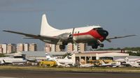 N153JR @ TNCM - Convair N153JR departing on runway 10 TNCM - by Daniel Jef