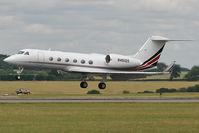 N461QS @ EGGW - About to touchdown on Runway 26. - by MikeP