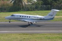 N96MT @ TNCM - N96MT main landing gear down on runway 10 - by SHEEP GANG
